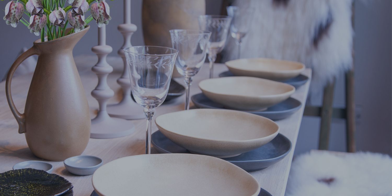 Blog Header Image - Dinner and glassware on modern rustic table - Seddon and Davison