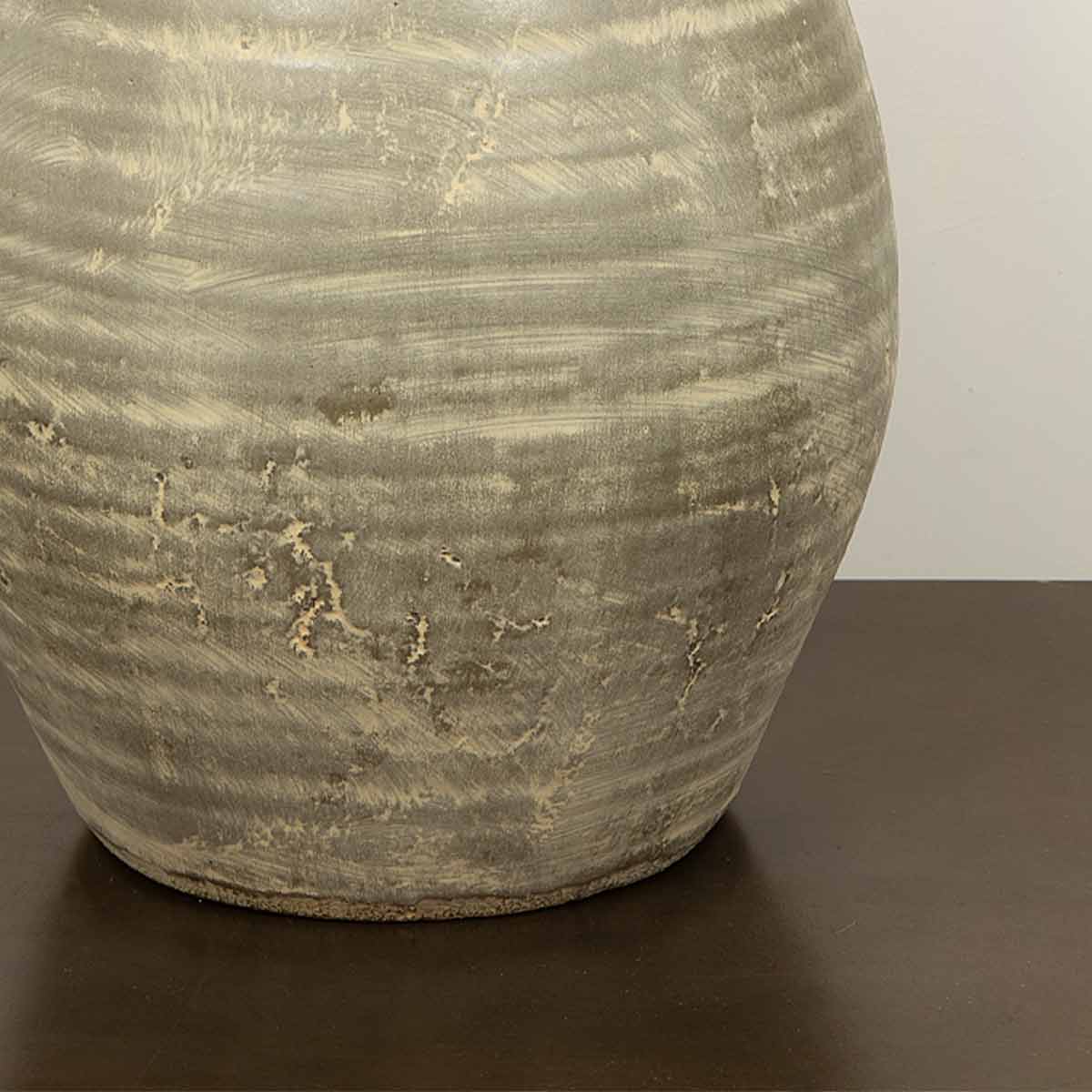 Aged Brown Terracotta Urn Vase with Handles – 33cm decorative terracotta vase on dark surface - Close up of base
