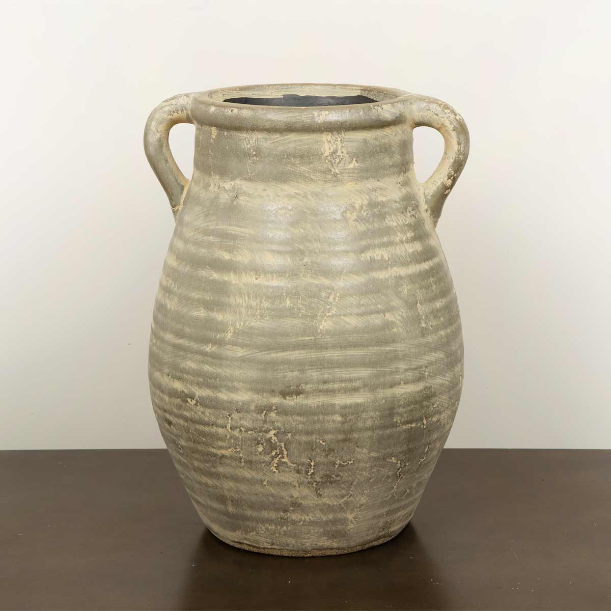 Aged Brown Urn Terracotta Vase with Handles – 33cm decorative terracotta vase on dark surface