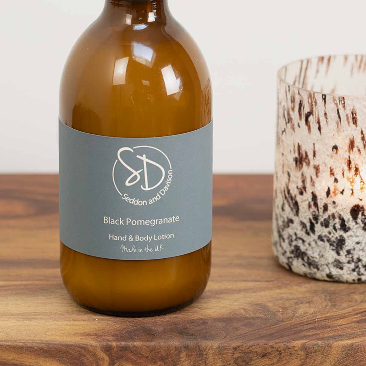 Amber Glass Hand and Body Lotion - Black Pomegranate by Seddon and Davison