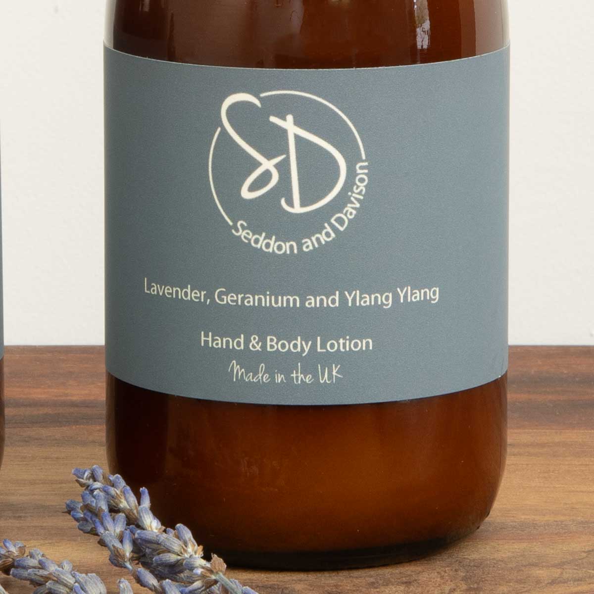 Amber Glass Hand and Body Lotion  - Lavender, Geranium and Ylang Ylang by Seddon and Davison