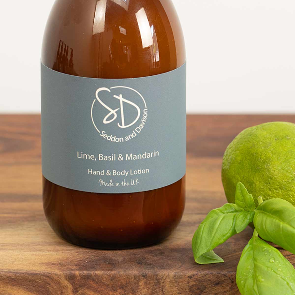 Amber Glass Hand and Body Lotion  - Lime, Basil and Mandarin by Seddon and Davison