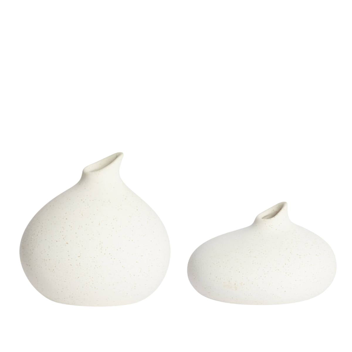 Two white Assaga Cream Ceramic Vases on a white background - Round shape with narrow neck