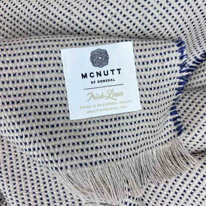 Athens Linen Chunky Throw – McNutt of Donegal - Close up weave and logo