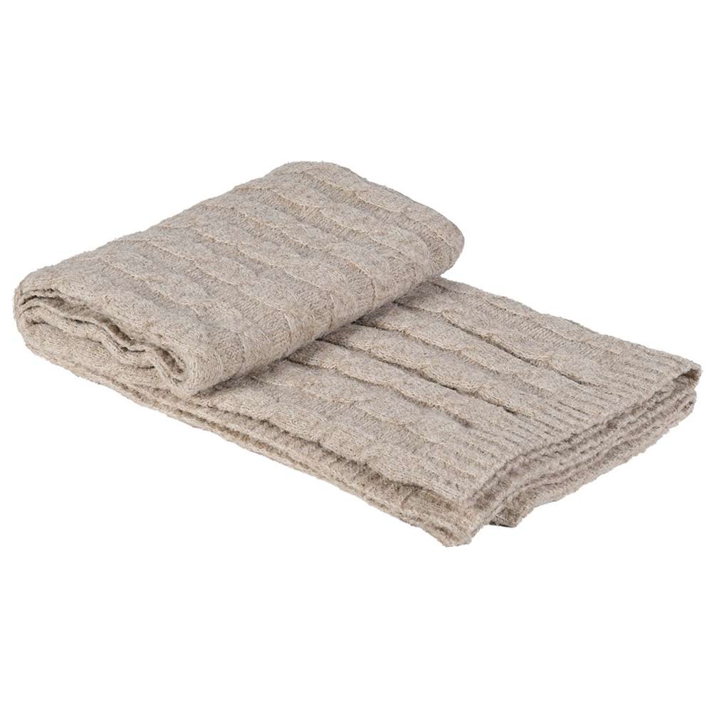 A folded textured knit blanket in a light oatmeal beige color, displayed on a clean white background.