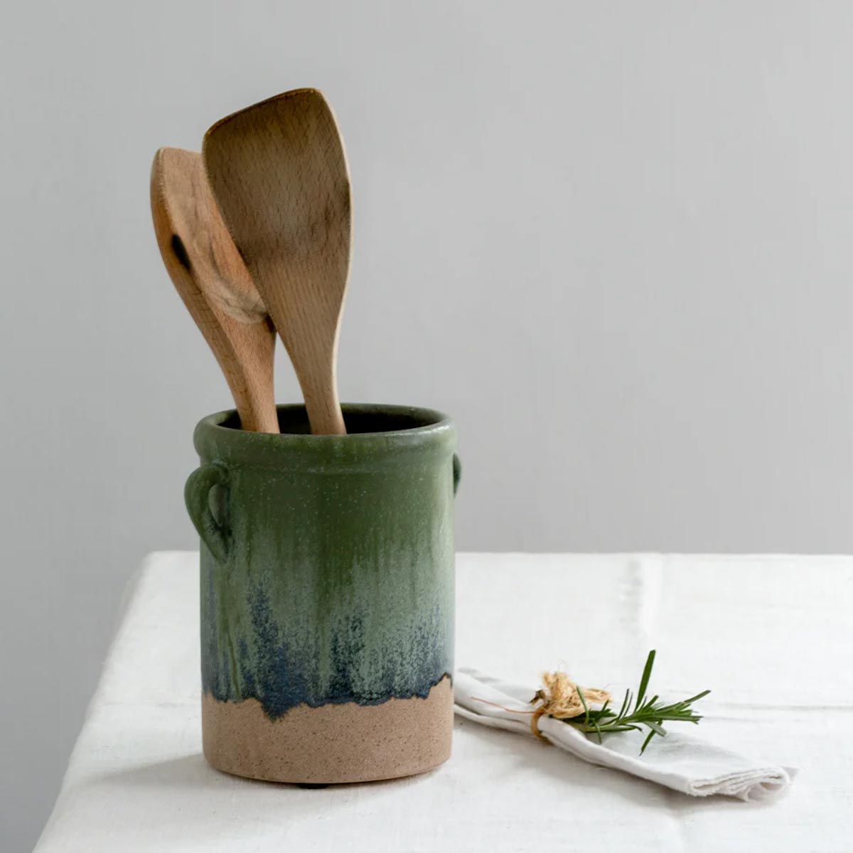 Blue Dipped Glazed Ceramic Jar with Handles – styled with wooden utensils and rosemary