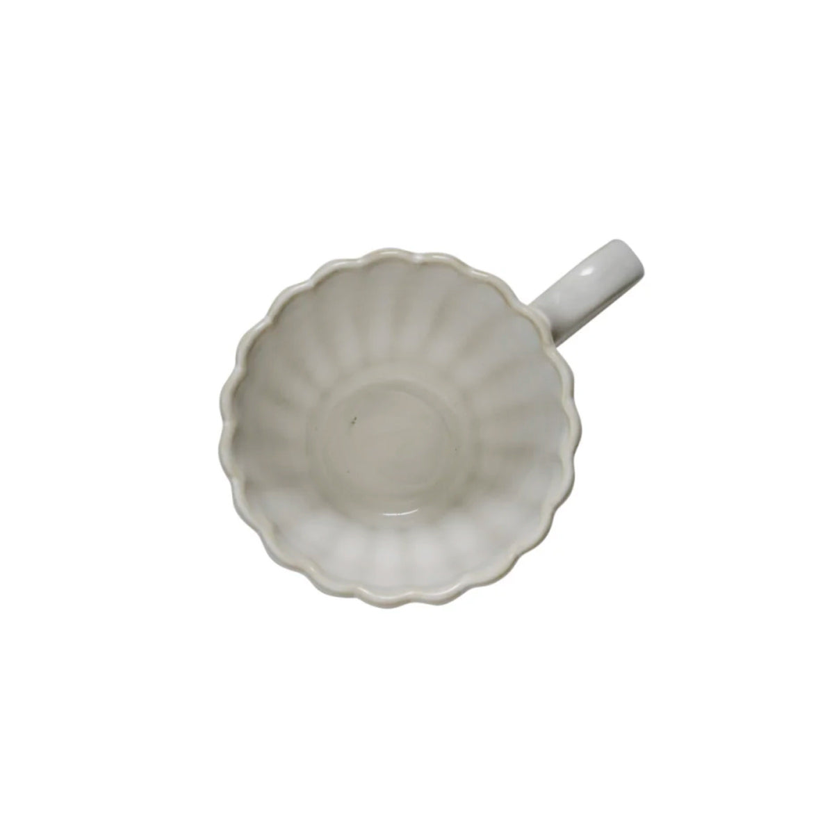 White Camille porcelain mug with a scalloped design on a white background - viewed from above