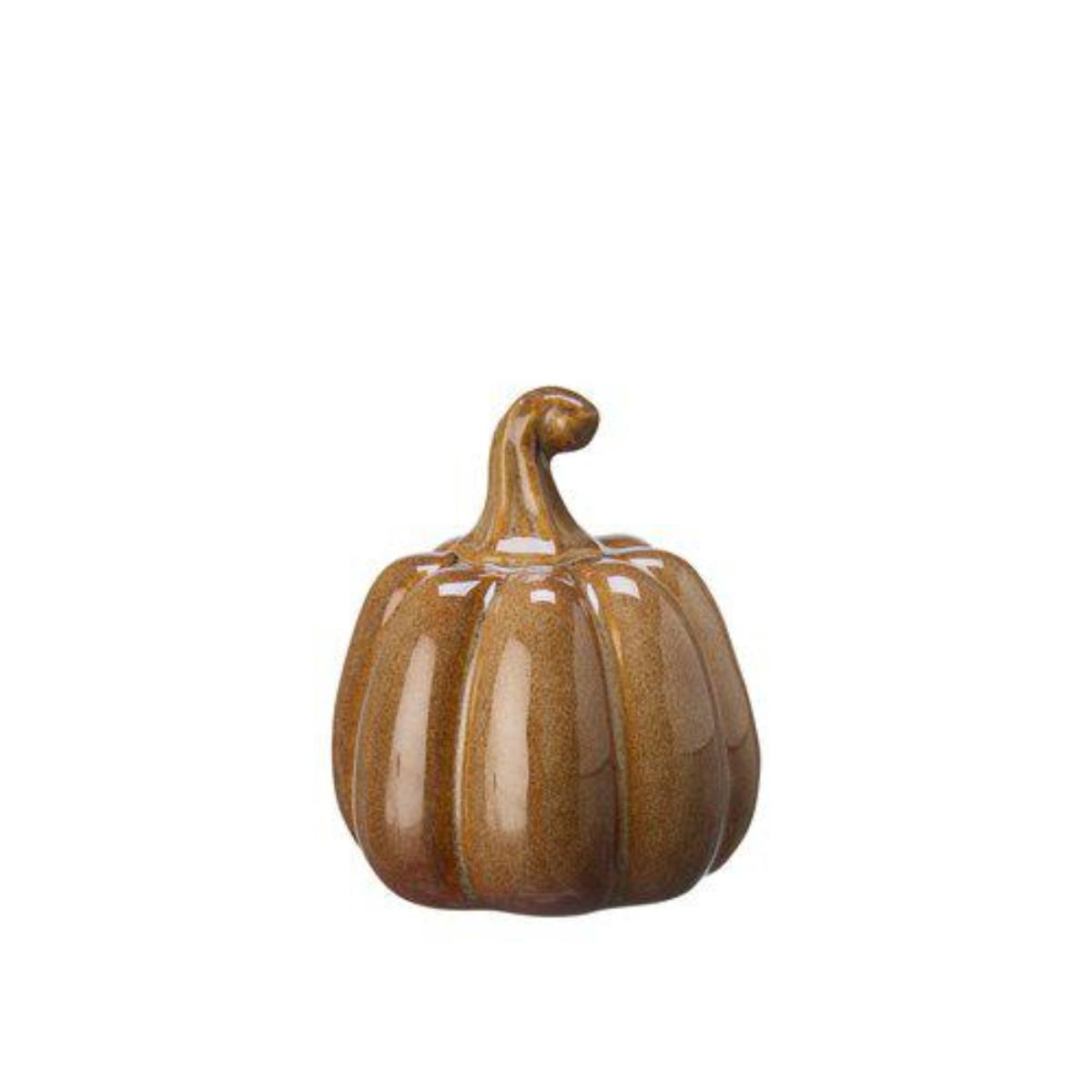 Brown ceramic pumpkin on a white background