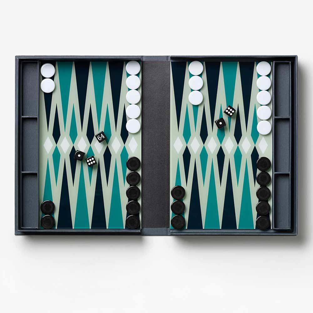 Classic Backgammon Set with pieces and dice with a blue patterned surface on a white background
