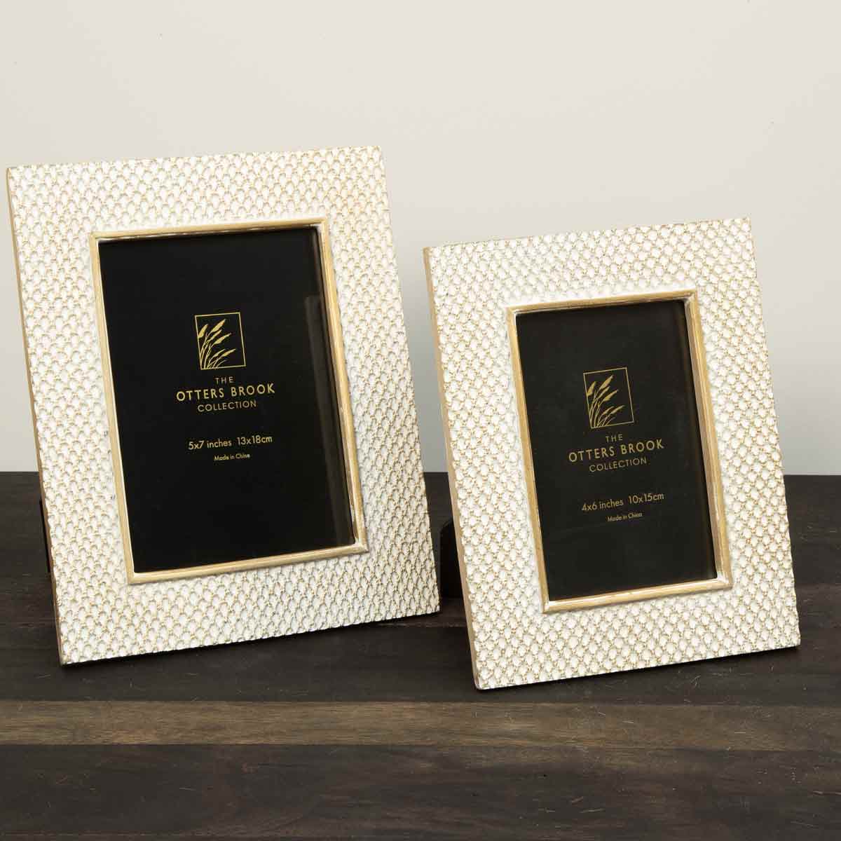 Cream and gold photo frame with criss cross texture styled on rustic wooden console – large 5x7" and small 4x6"