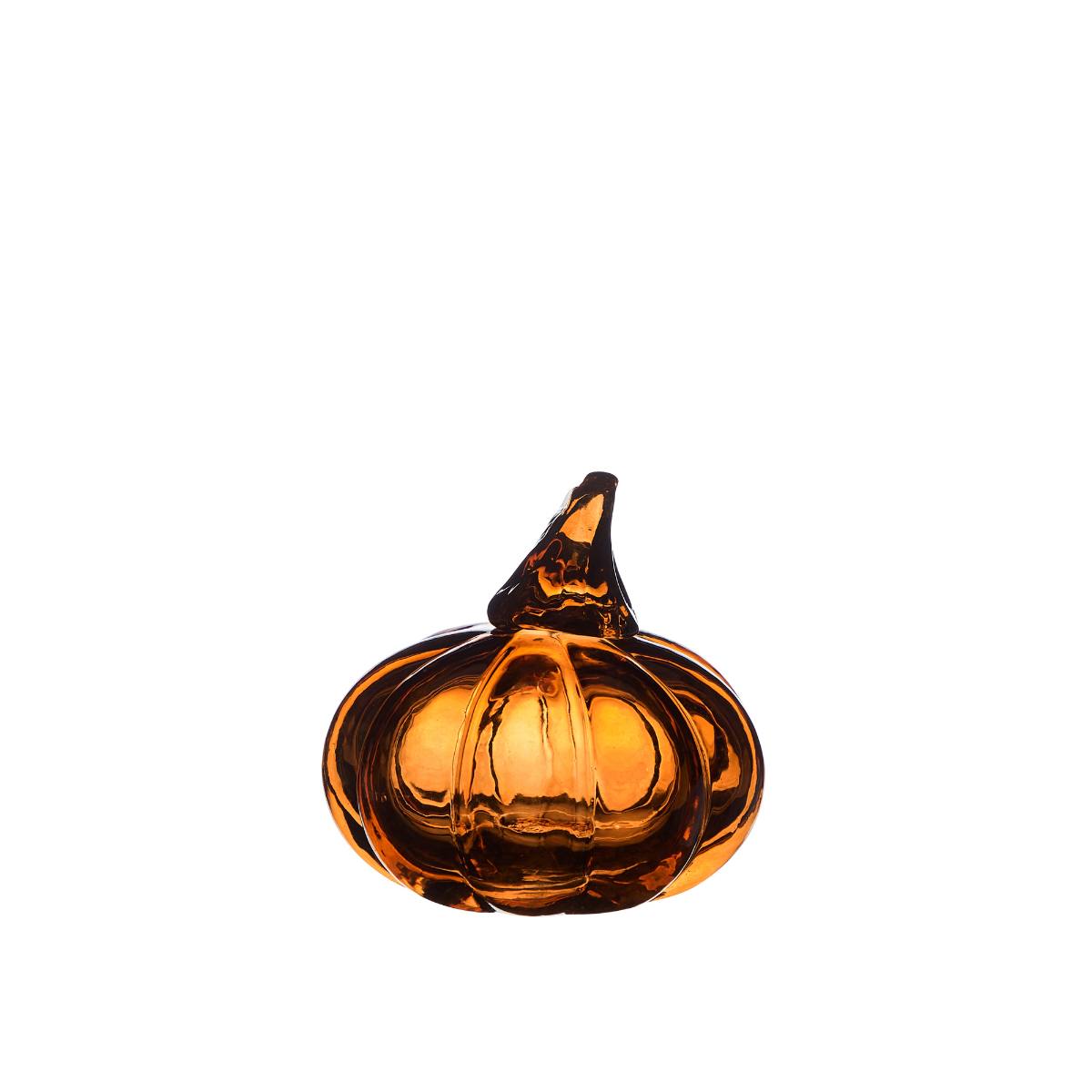 Small Dark Amber Glass pumpkin decoration on a white background