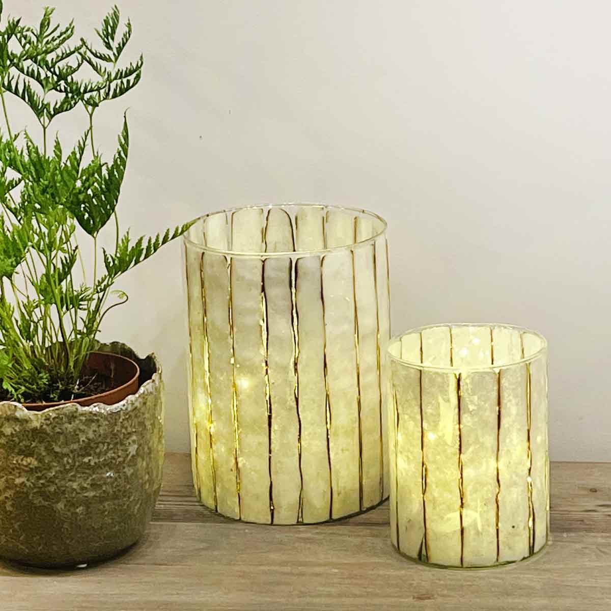 Drino Glass Candle Holders - with amber and white rustic strupe effect. Large and small sizes shown together