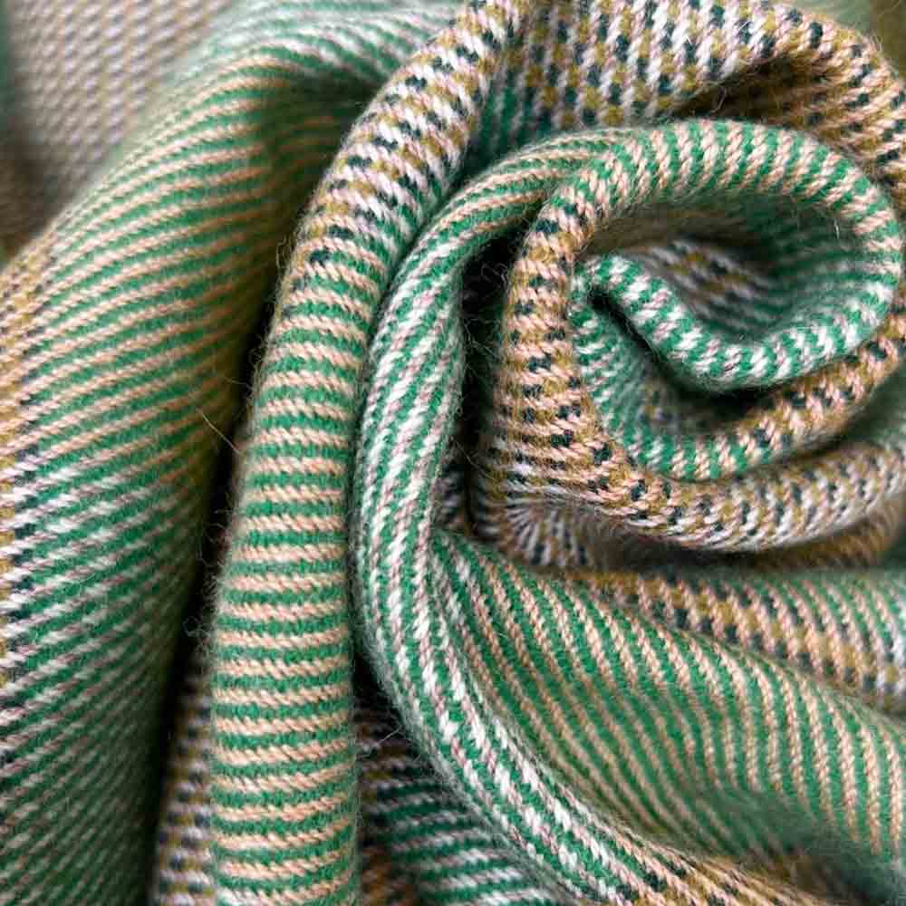 Enya Merino Lambswool Throw – McNutt of Donegal - Close up of earthy brown and green weave