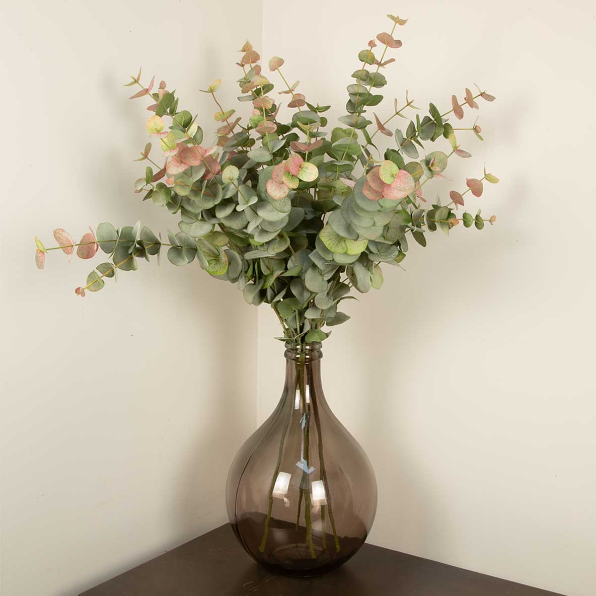 Vase with Faux Eucalyptus Tall Rose Spray - artificial leaves on a neutral background
