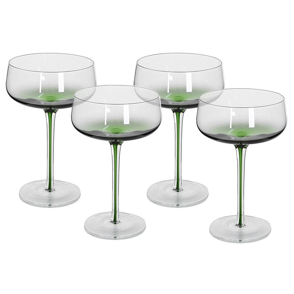 Four stemmed wine glasses with predominatly clear bowls and green stems, arranged on a plain white background.