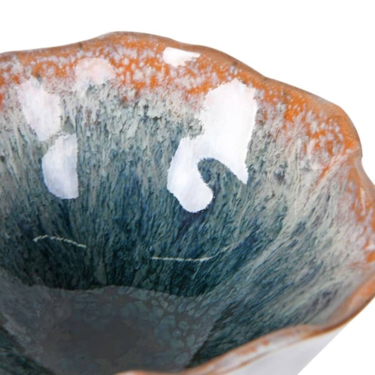 Close-up of a ceramic Green Ombre Sugar Bowl with textured interior and rim