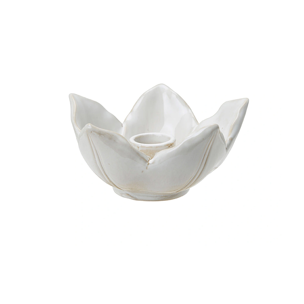 White porcelain flower-shaped candlestick with petal design for taper candles