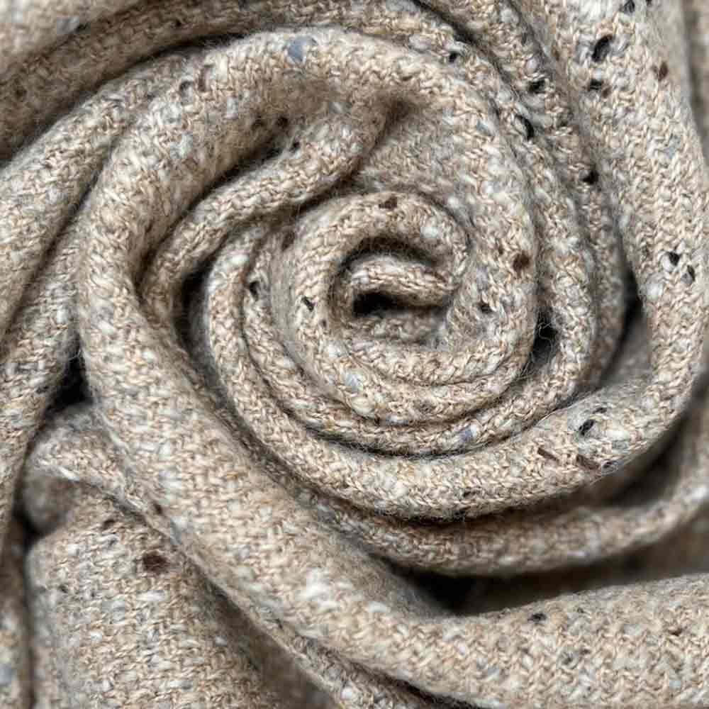 McNutt Inishkeel Oatmeal Donegal Lambswool Tweed Throw - Close up textured weave in a swirl display
