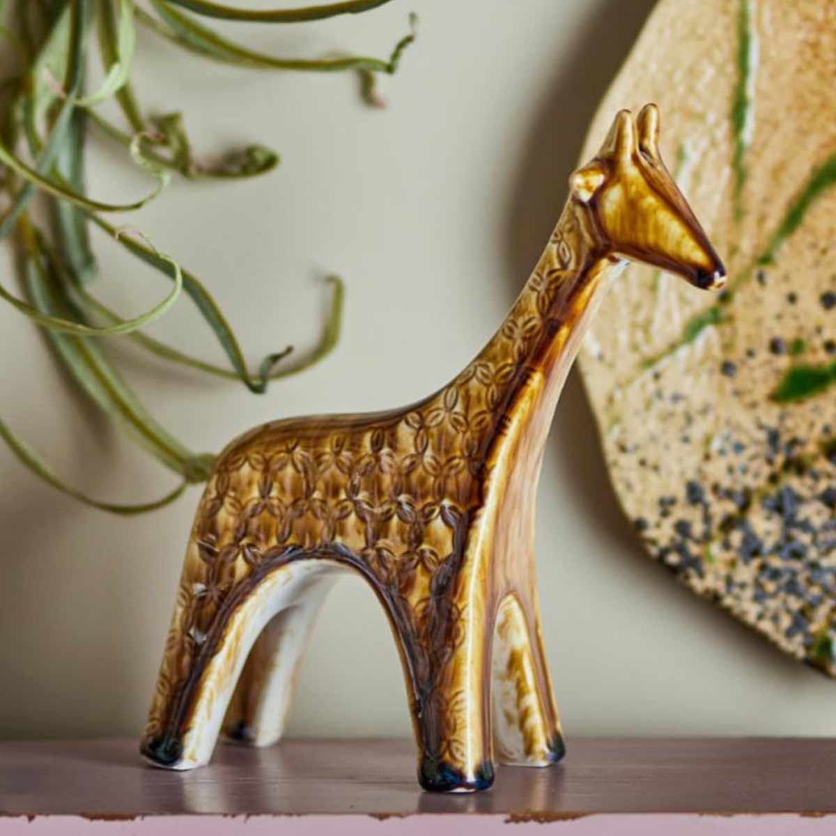 Longuro Stoneware Giraffe Decoration – handmade decorative giraffe figurine with patterned reactive glaze styled on shelf