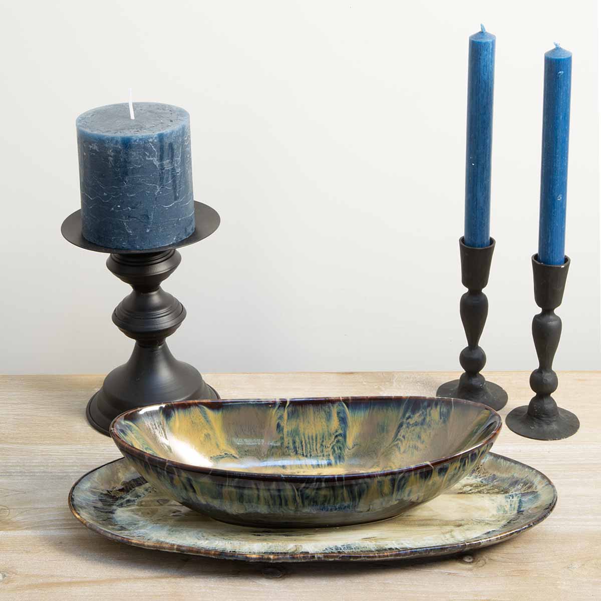 Ocean Glaze Decorative Bowl with Hand-Painted Coastal Reactive Glaze - Displayed with Blue Dinner and Pillar Candles
