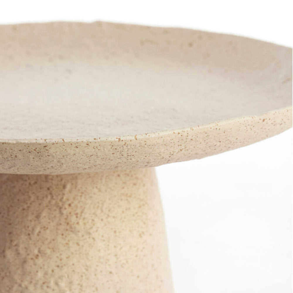 Close up of Ota Sand and Light Brown Plate on Stand on a white background