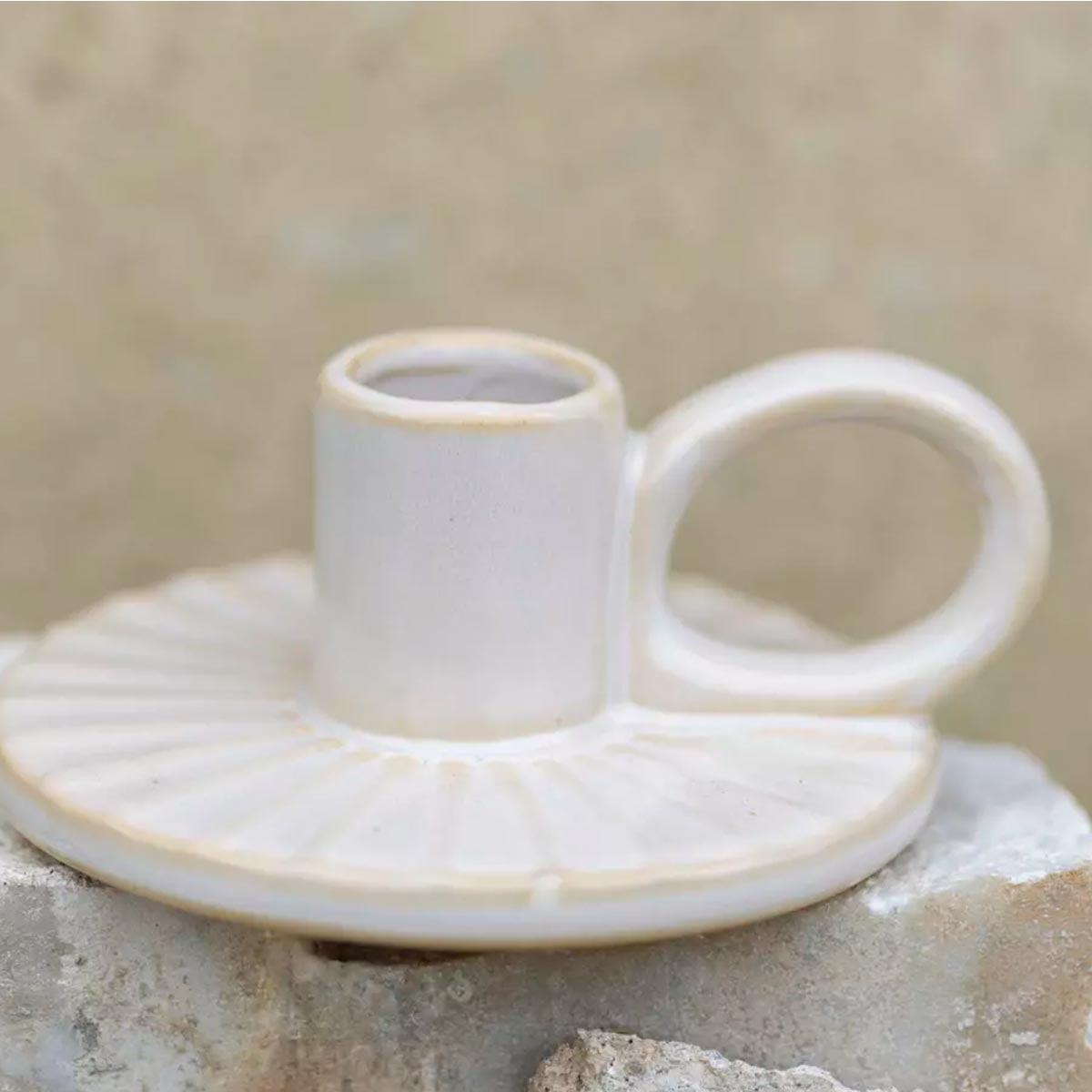 Padstow Stoneware Candle Holder – artisan-made candle holder with reactive finish in white and ecru - Close up of texture
