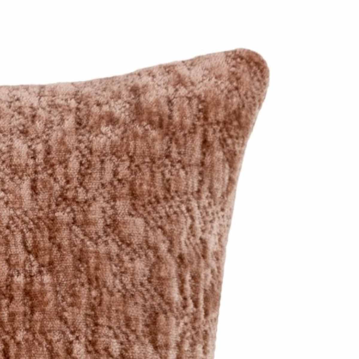 Close up of corner of Piper Square Rose cushion with a rippled, velvet texture shown on a white background