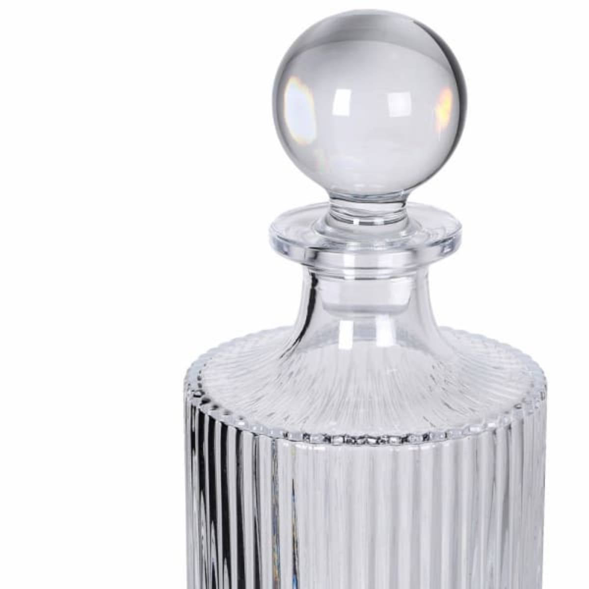 Clear glass decanter with a spherical stopper on a white background - part of Ribbed Glass Decanter and Glass Set