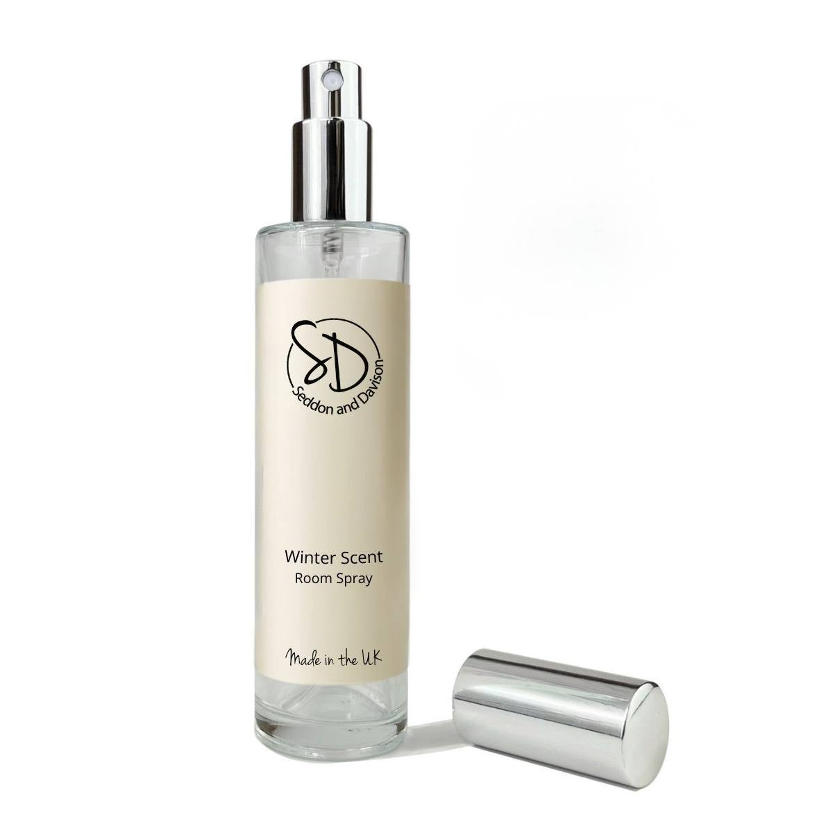 Room Spray - Winter Scent by Seddon and Davison in glass bottle, shown with lid off on white background