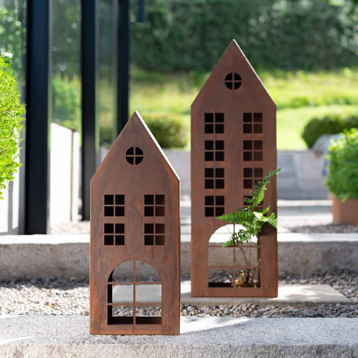 Rustic Iron House Candle Holders Displayed Outside