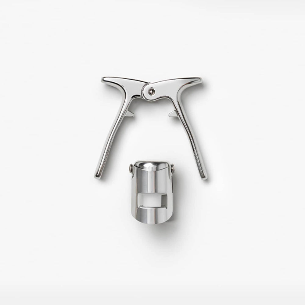 Metallic wine bottle opener and stopper on a white background - part of The Essentials - Champagne Tools Gift Set