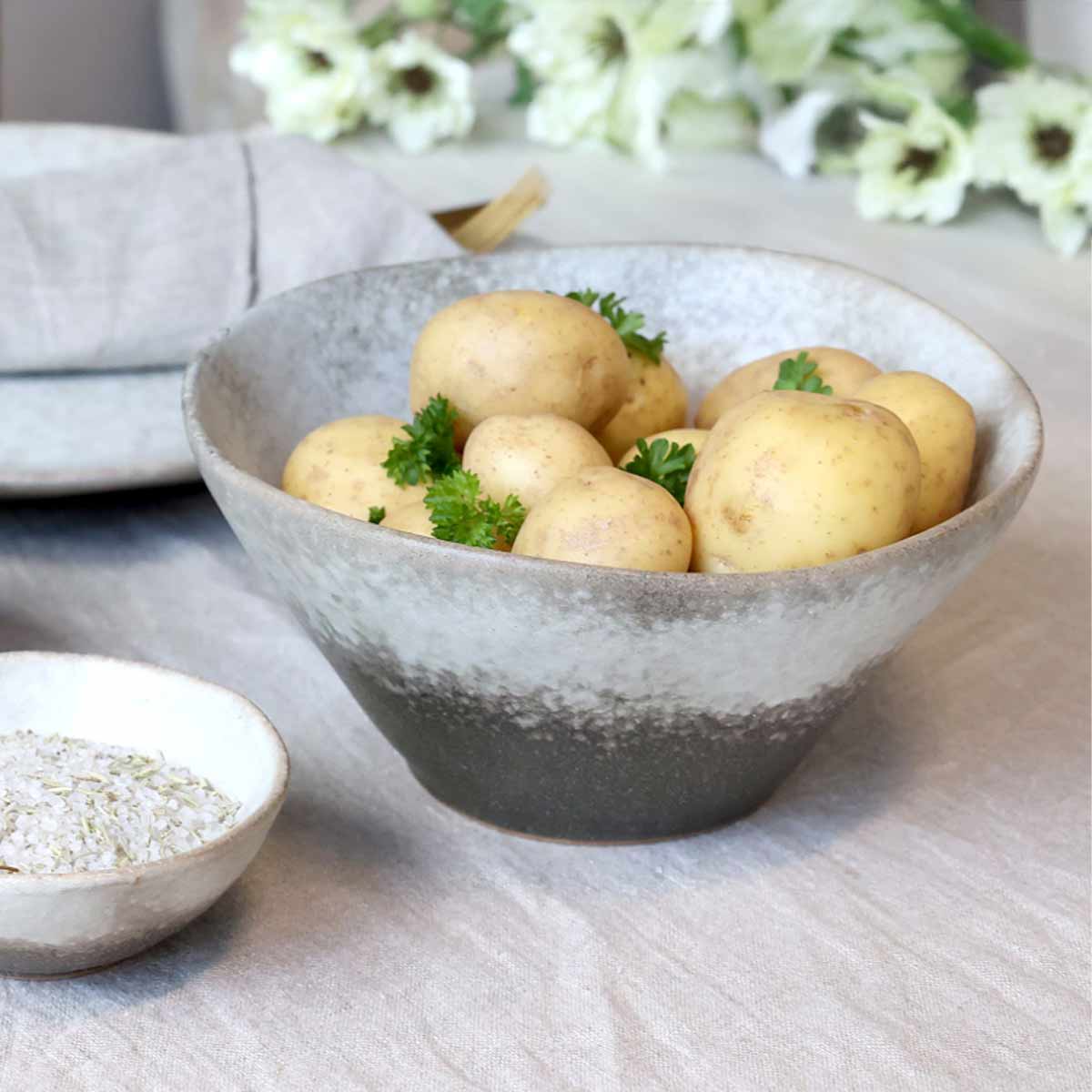 Valence Porcelain Bowls in Walnut Glaze – Large bowl displayed with potatoes and fresh flowers