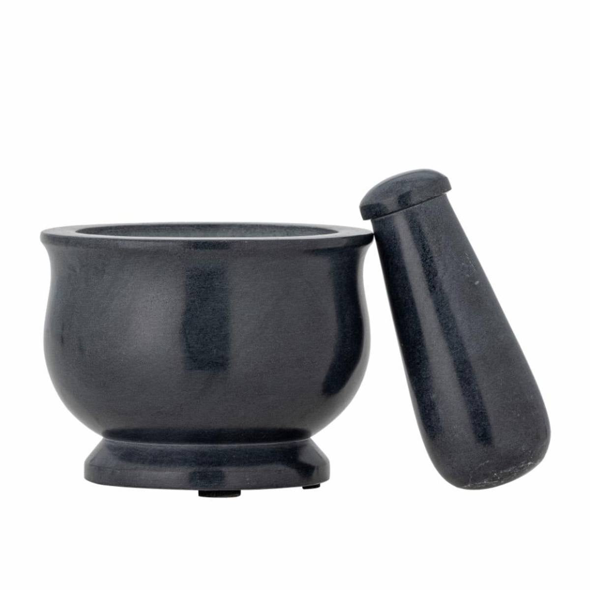 Black mortar and pestle on a white background