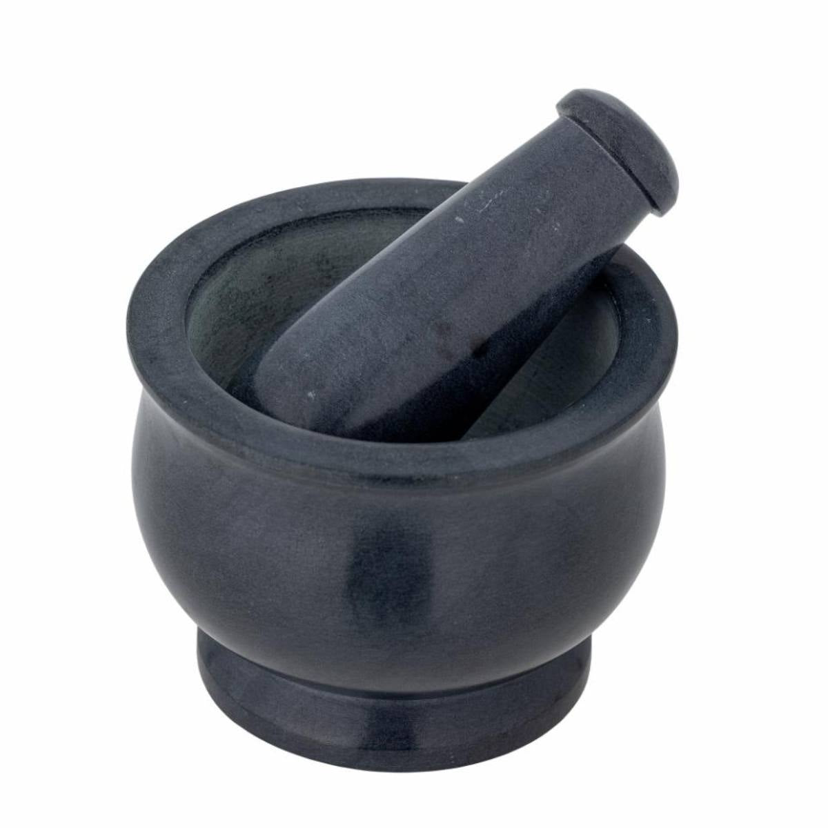 Black mortar and pestle on a white background