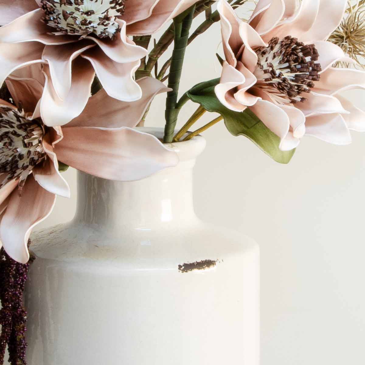 Ivory distressed bottle vase - close up of neck of the vase