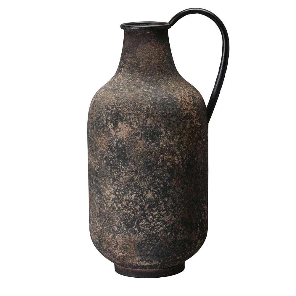 A rustic dark brown and black metal vase with a textured, speckled finish and a curved handle, shown against a plain white background.