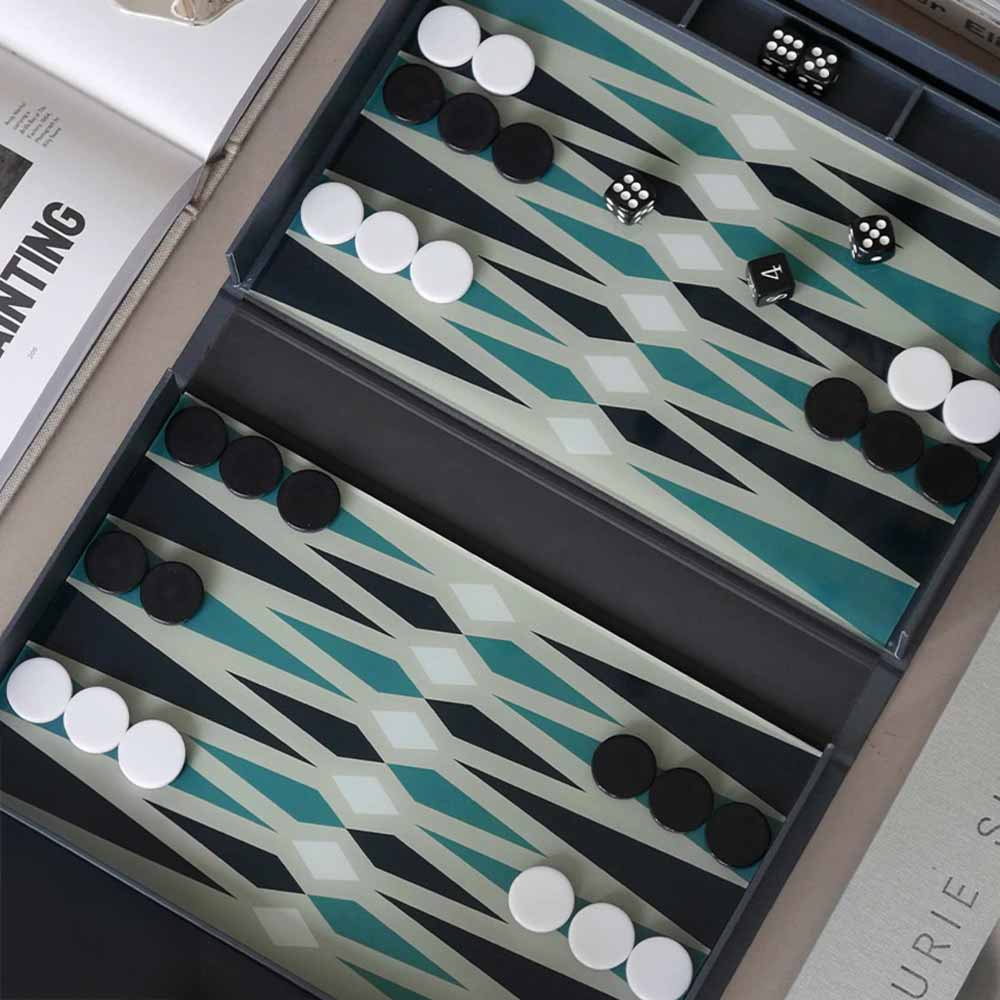 Classic Backgammon Set with pieces and dice with a blue patterned surface