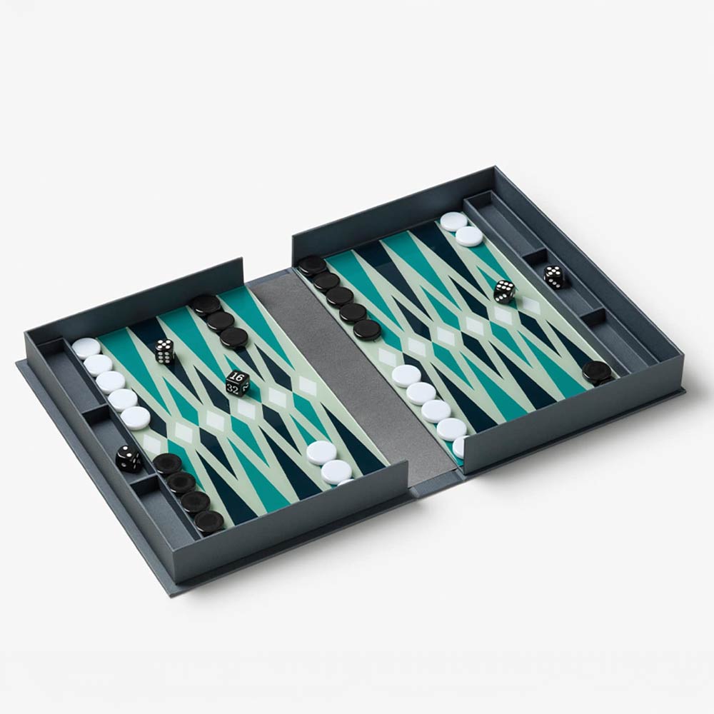 Classic Backgammon Set with pieces and dice with a blue patterned surface