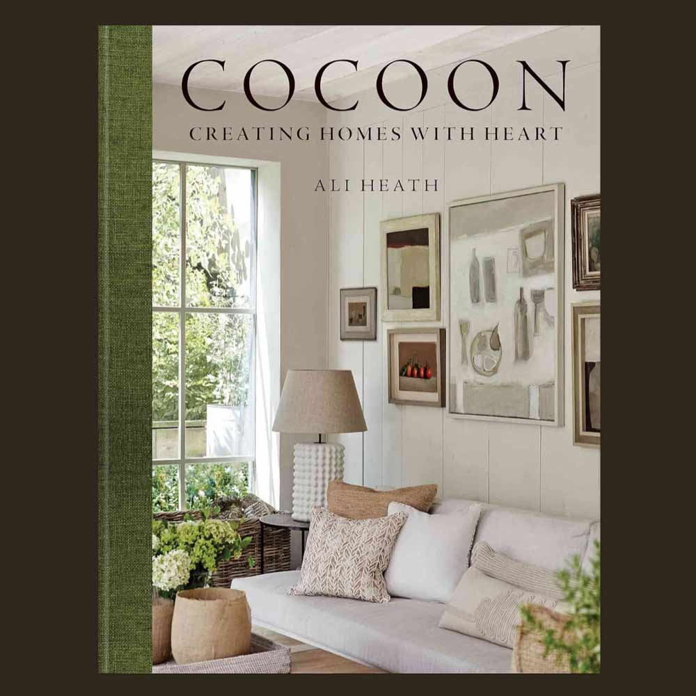 Hardback book Cocoon by Ali Heath with interior design focus and colour photography