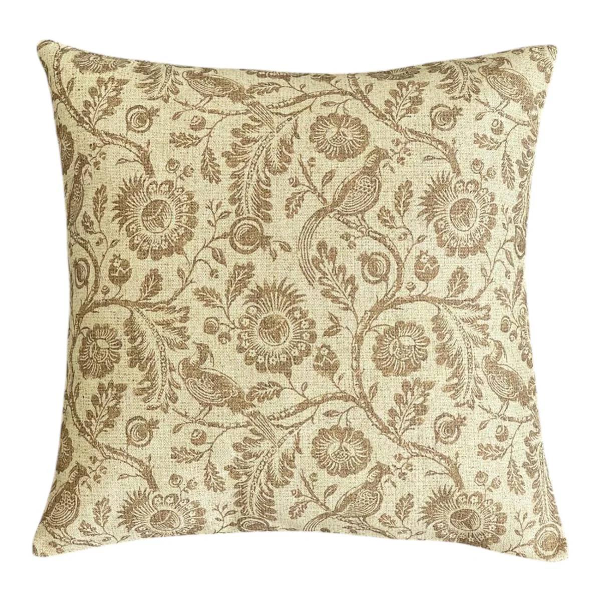 Decorative Countryside Cushion in Mustard with floral and bird pattern on a beige background