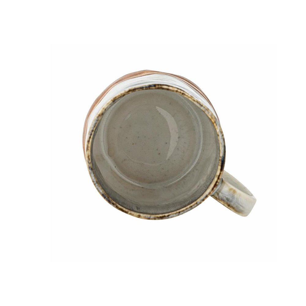 Ceramic Deana mug with a rustic finish on a white background