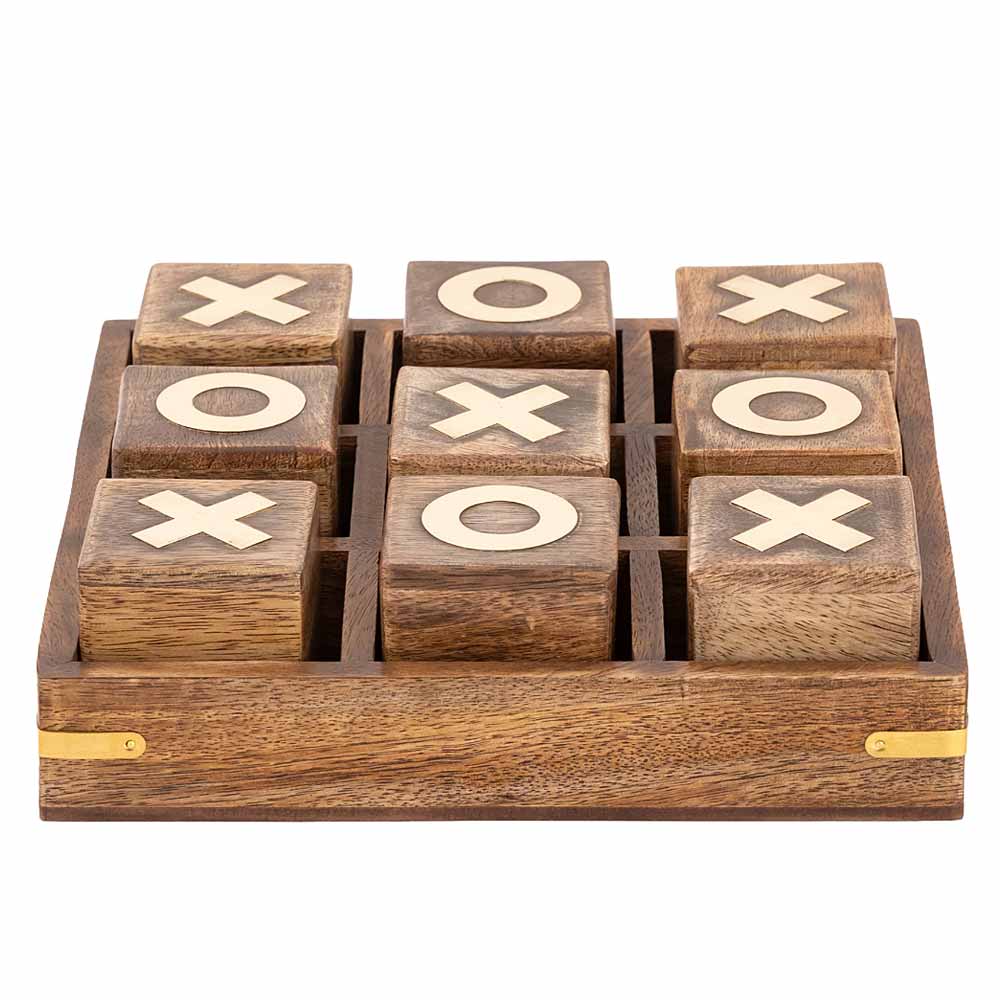 A wooden 3-in-1 tic-tac-toe game set with nine carved wooden blocks featuring a brass style inlay 'X' and 'O' symbols, presented in a matching wooden tray with brass corner accents, on a solid white background.