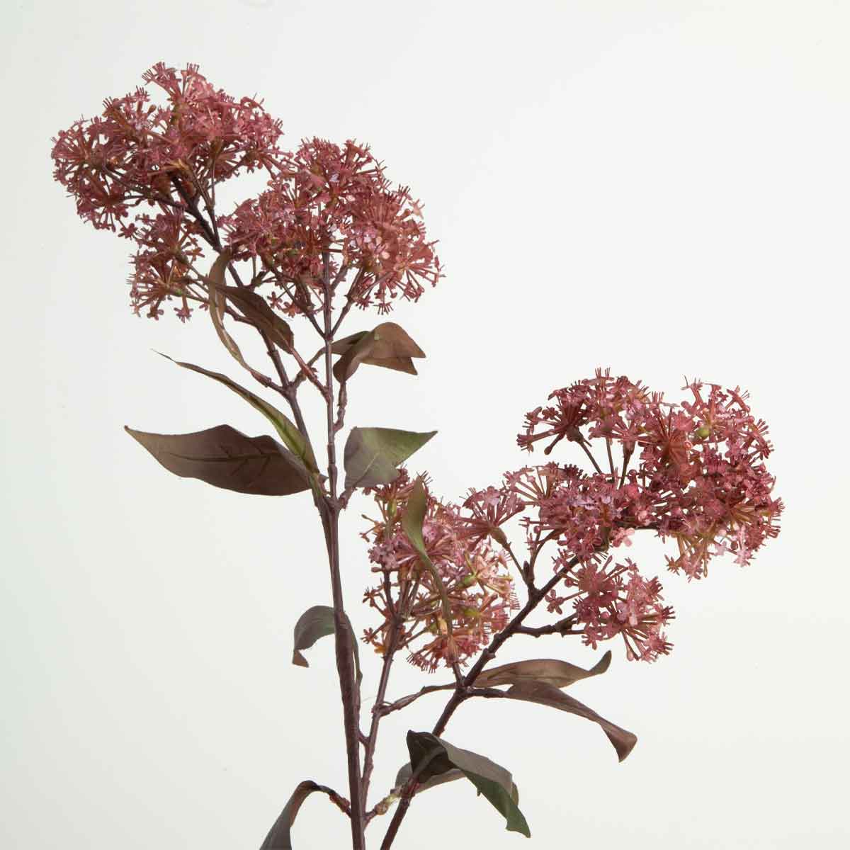 A single artificial burgundy smokebush stem with green leaves and purple flowers against a white background.