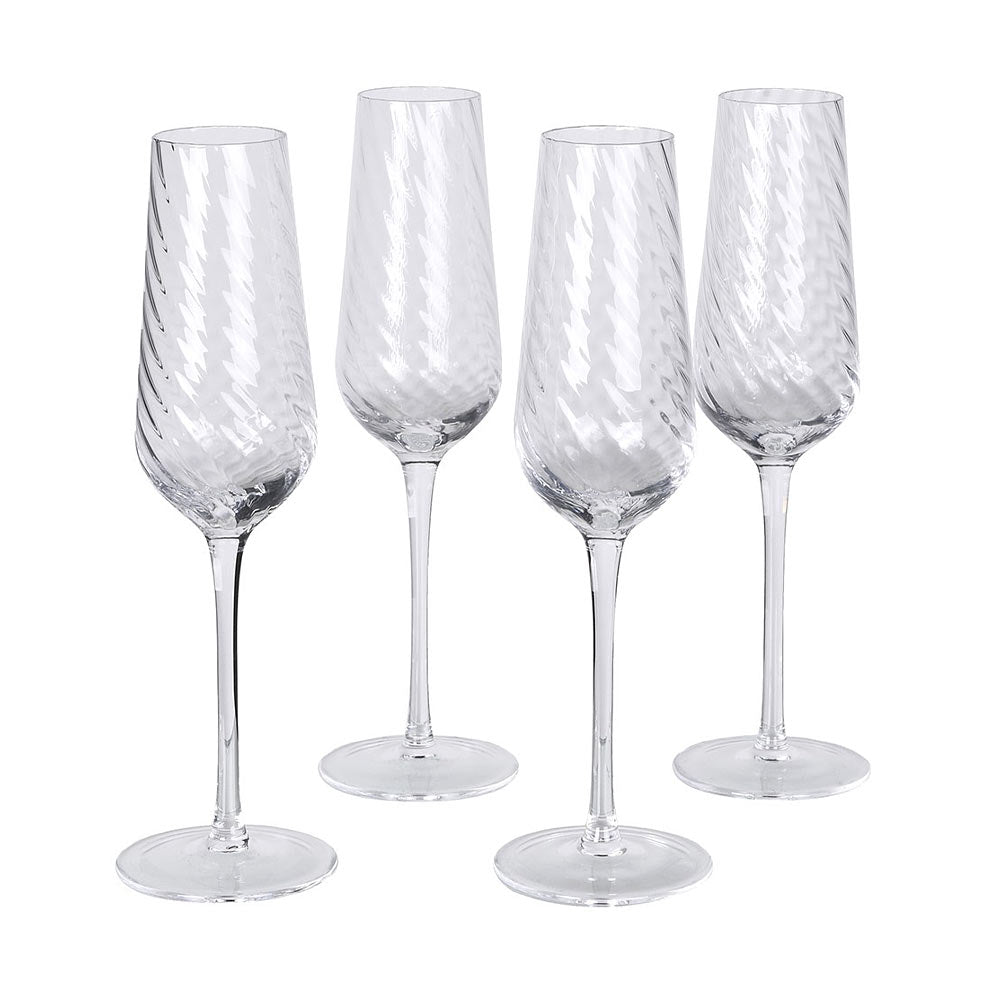 Four Etta clear glass champagne Flutes with spiral design on a white background