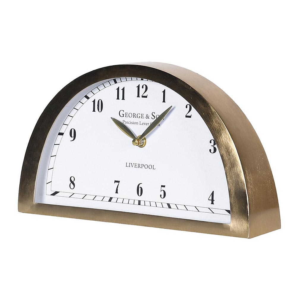 A George & Son Liverpool table clock with a semi-circular gold-toned metal frame and a white dial face with black numbers and gold  hands.