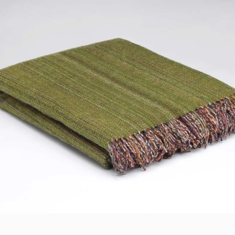 Heritage Meadow Green Tweed - Pure Merino Wool Throw - McNutt of Donegal with multicolored fringe on a white background