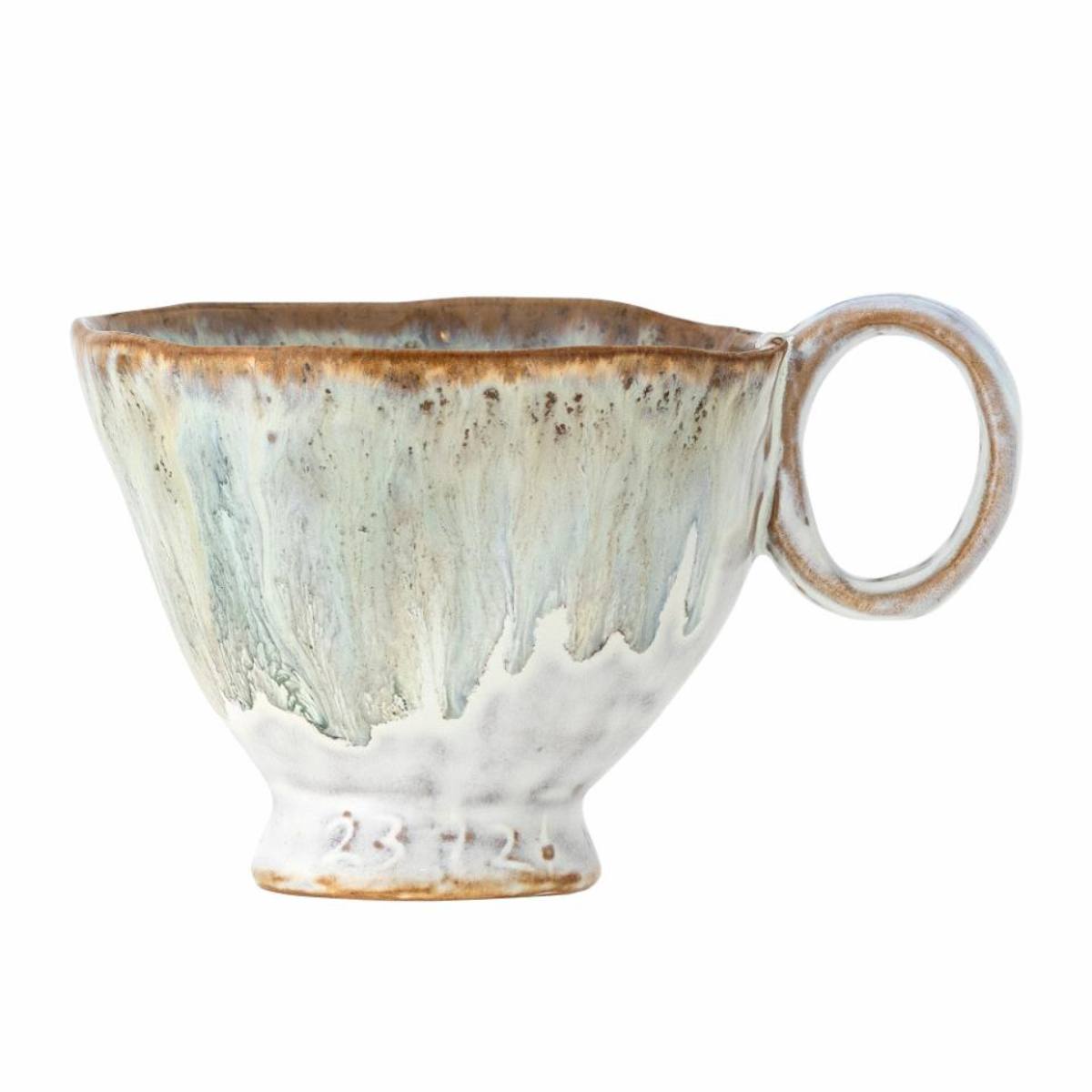 Handmade Imogen cup with grey-green reactive glaze on a white background
