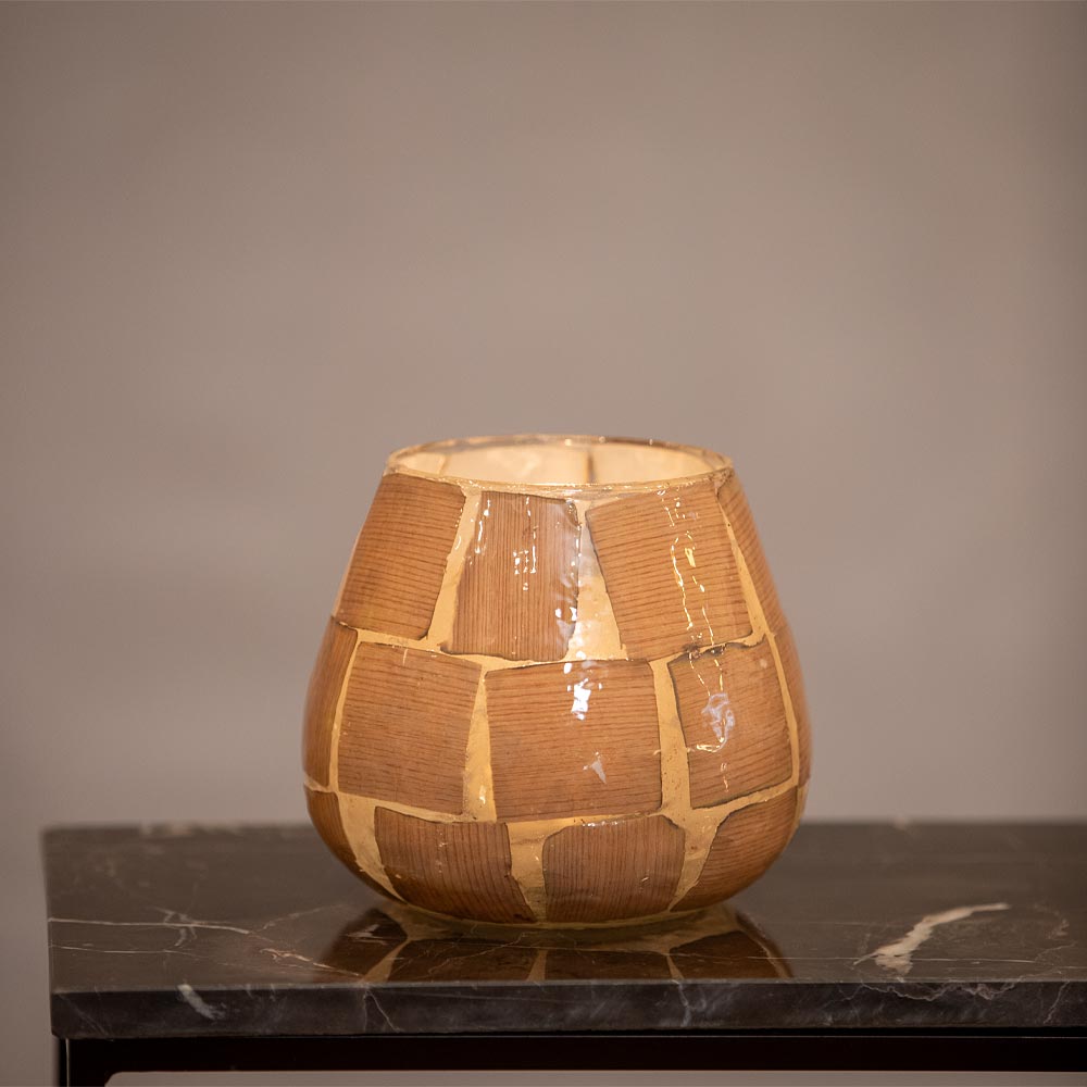 Large Kuala Glass votives on a marble surface with a neutral grey background