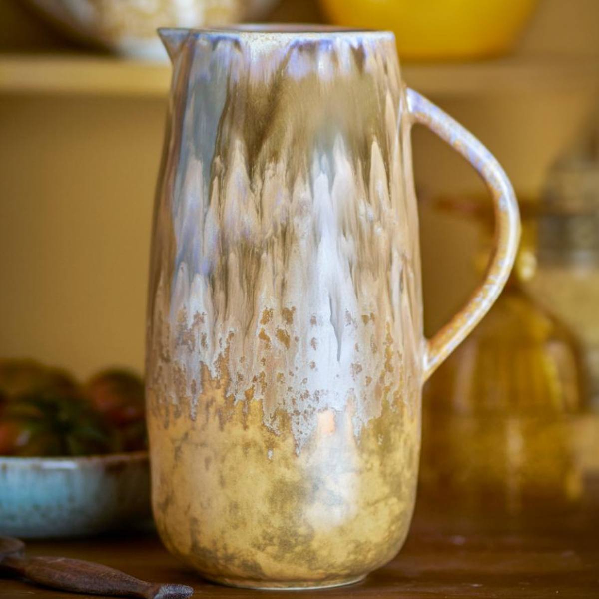 Lacey Stoneware Jug styled on a kitchen shelf with other rustic accessories - Golden and Ochre reactive glaze