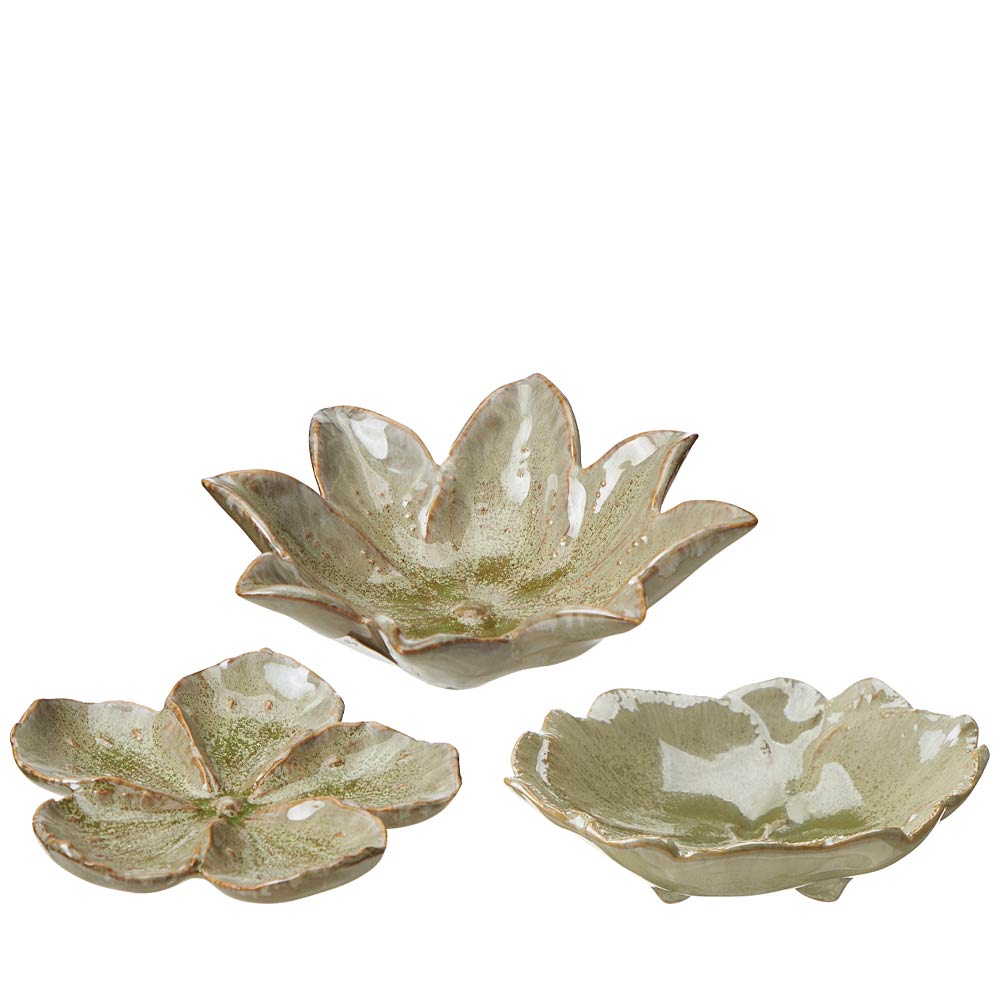 Three ceramic lotus-shaped bowls in a speckled sage green and cream glaze, arranged on a plain white background.